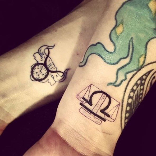 Two cool knot Couple Tattoo on the wrist Tattoo Design