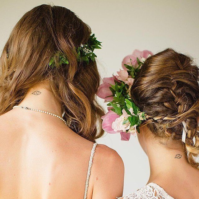 Two Women with matching Reindeer Tattoos Tattoo Design