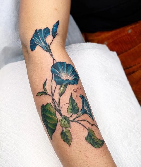 Lush Violet Morning Glories on Inner Arm Tattoo Design