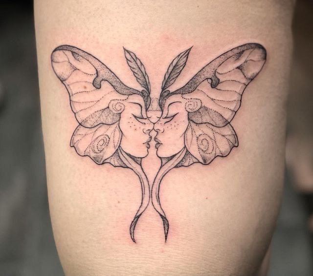 Matching Moth Tattoo with Faces Tattoo Design