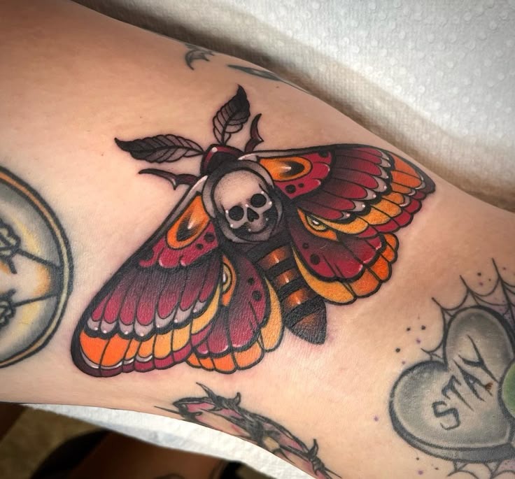 Skull Moth Tattoo with Bold Colors Tattoo Design