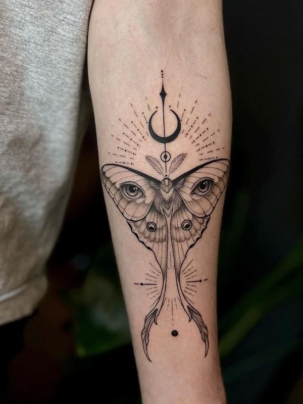Surreal Luna Moth Tattoo with Eyes Tattoo Design