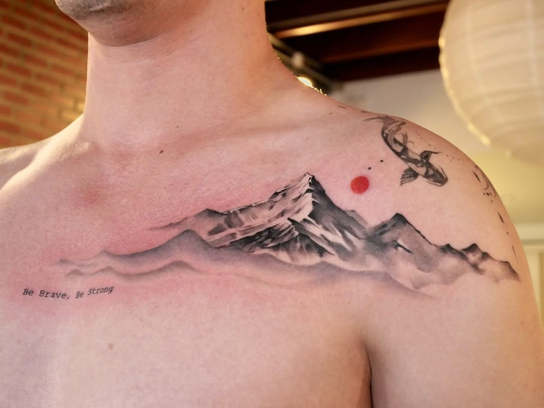 A stunning mountain tattoo with inspiring text. Tattoo Design
