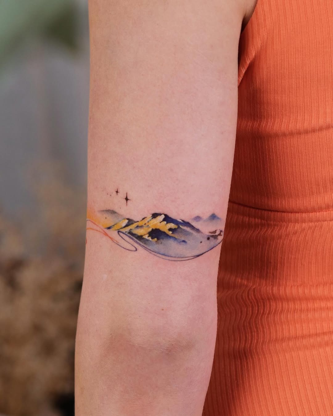Colorful mountain scene with sunset vibes and stars Tattoo Design