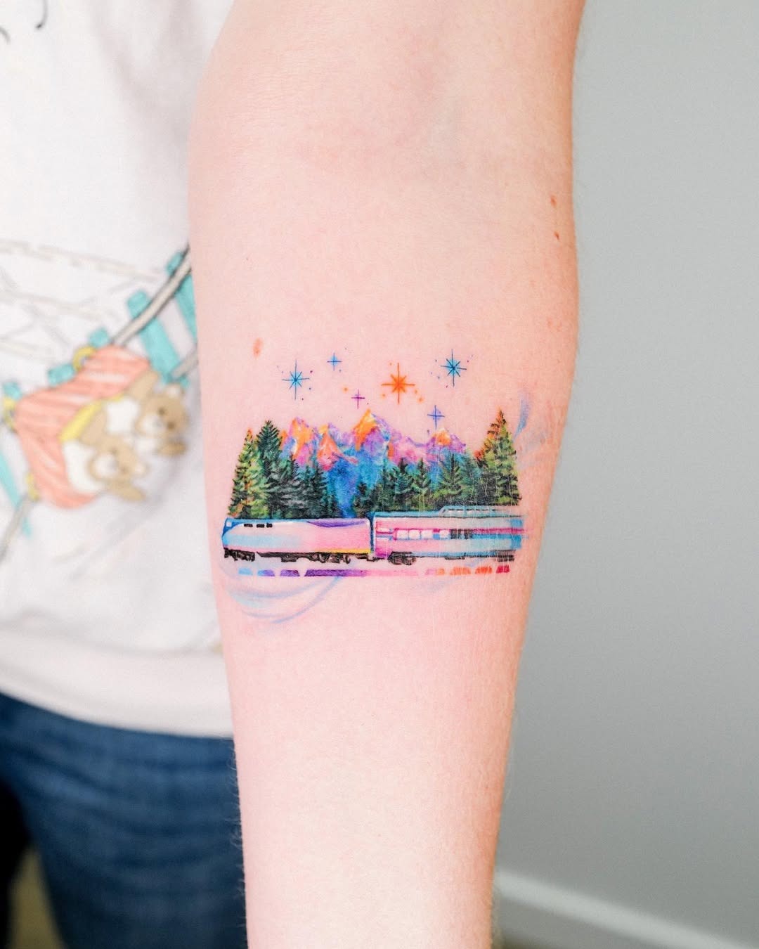 Colorful mountain tattoo illustrating nature’s beauty. Tattoo Design