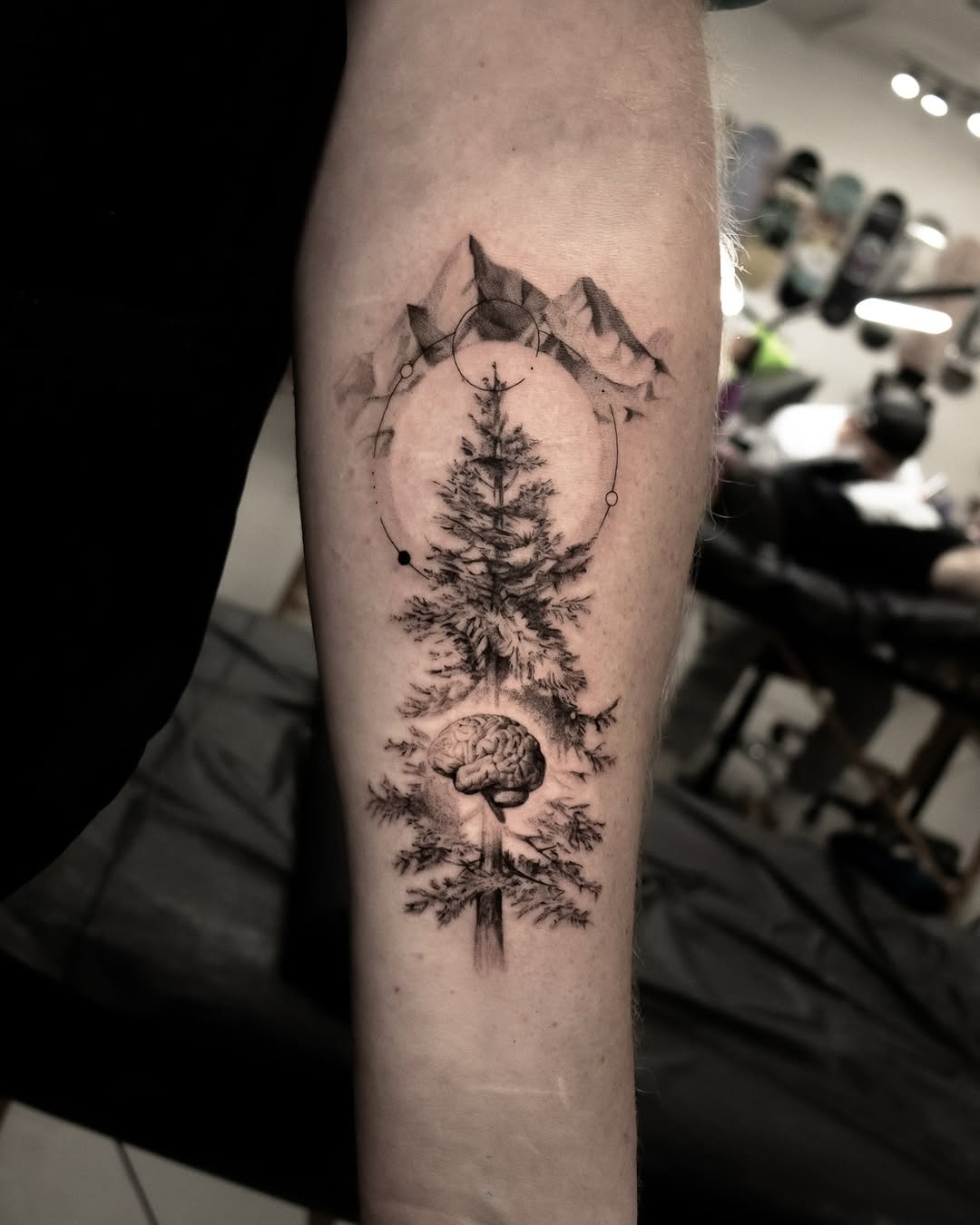 Intricate mountain and tree tattoo with brain Tattoo Design