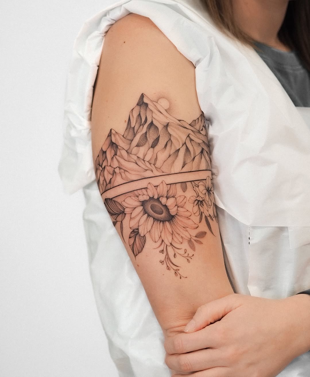 Stunning mountain and floral tattoo blend design Tattoo Design