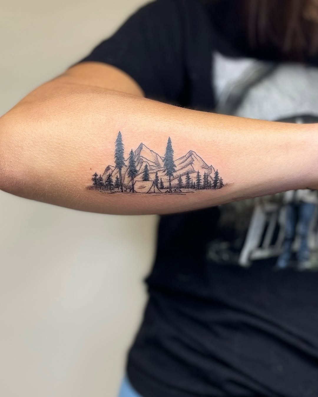 Stylish mountain scene tattoo with camping vibes Tattoo Design
