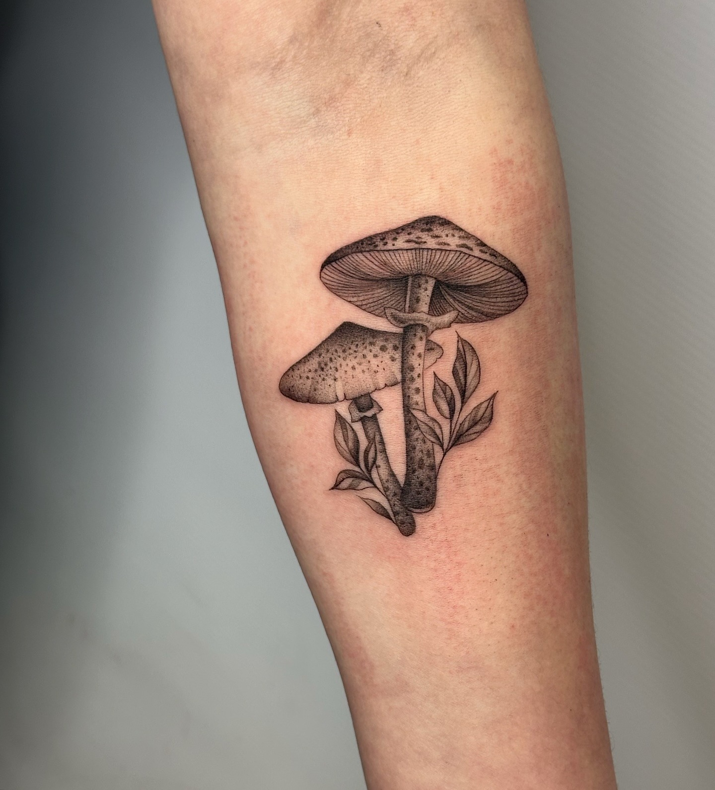Fine Line Mushroom Tattoo with Leaves Tattoo Design