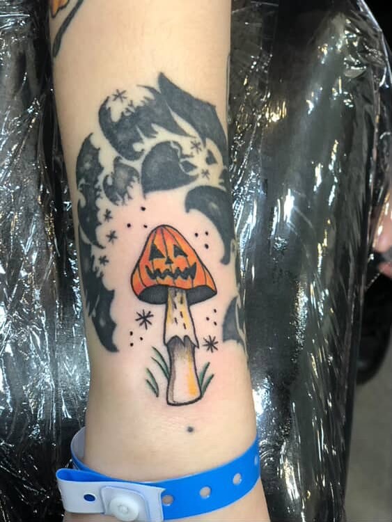 Halloween Mushroom Tattoo with Jack-O’-Lantern Design Tattoo Design