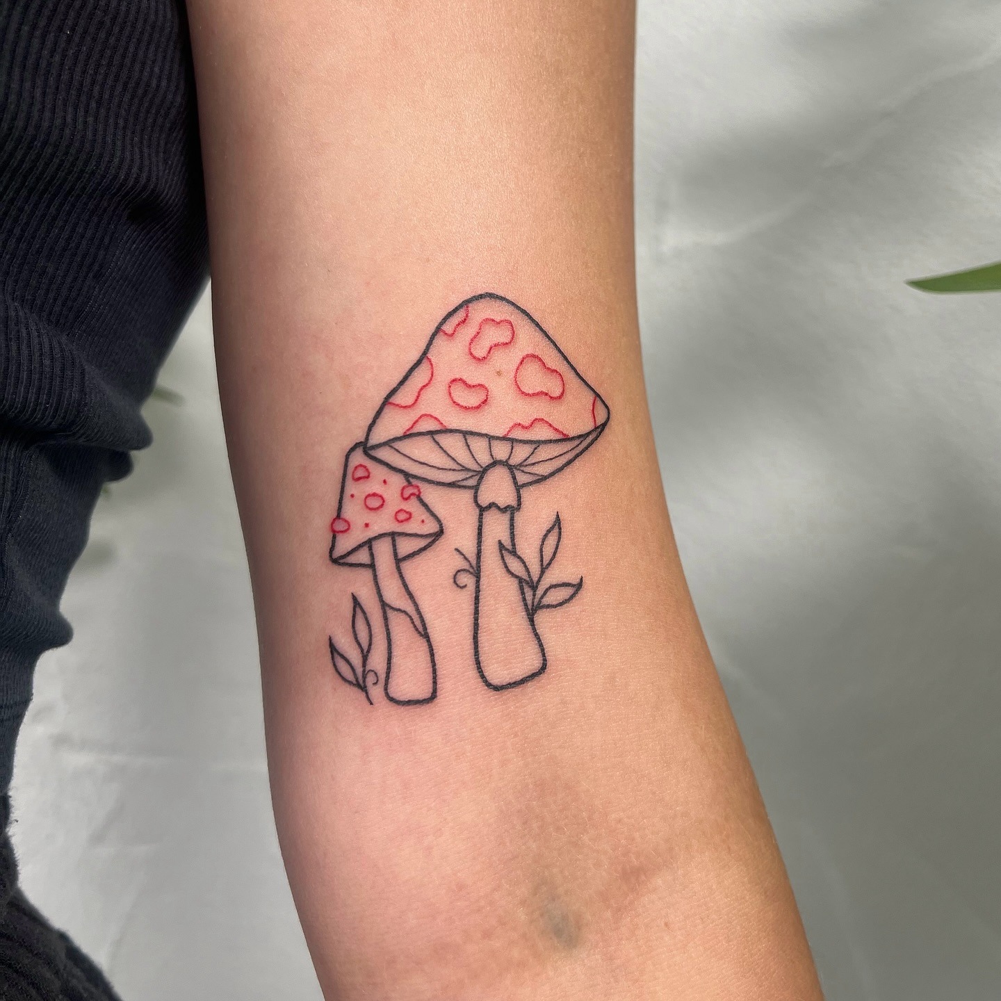 Minimalist Red Mushroom Tattoo with Fine Line Details Tattoo Design