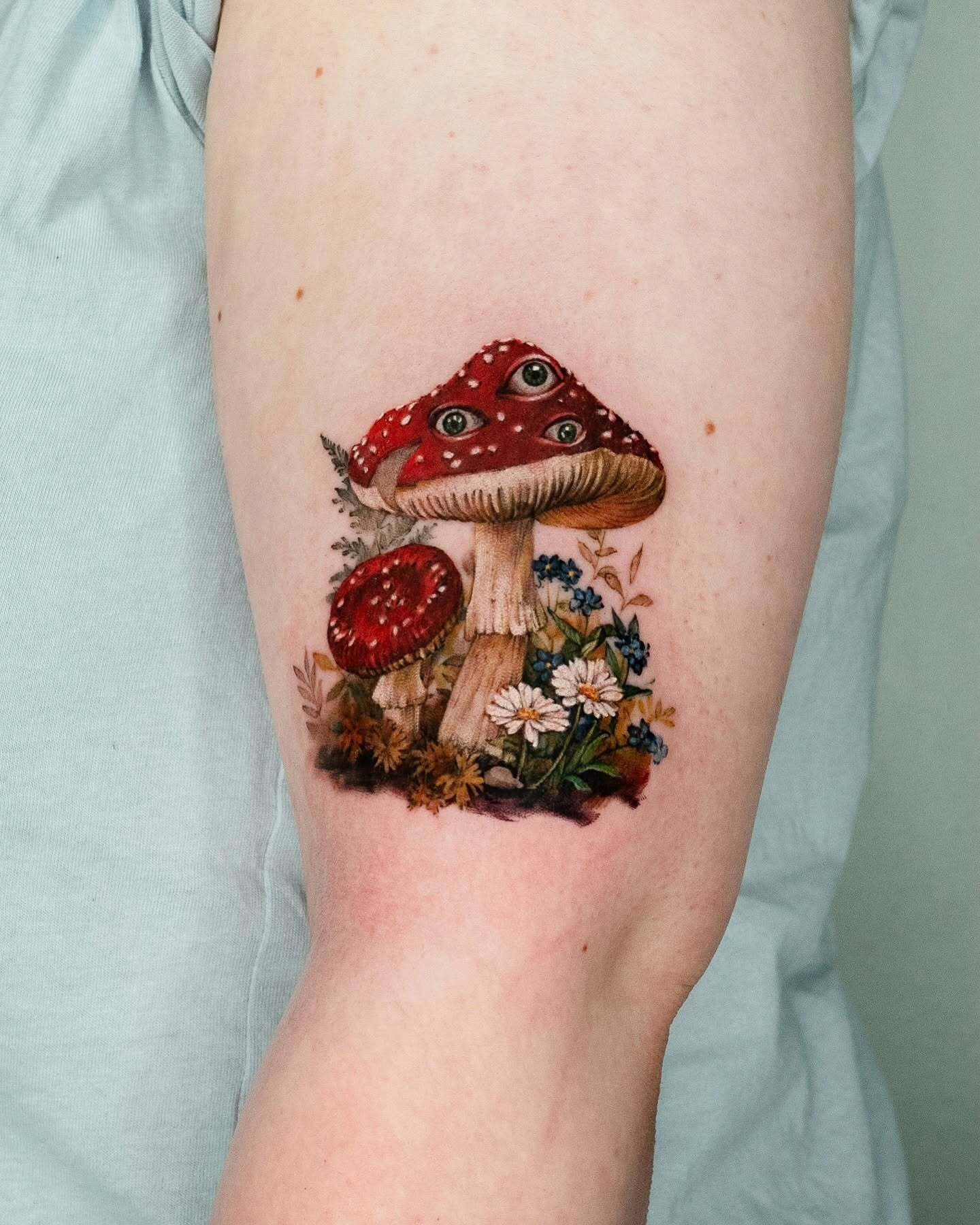 Surreal Amanita Mushroom Tattoo with Eyes and Flowers Tattoo Design