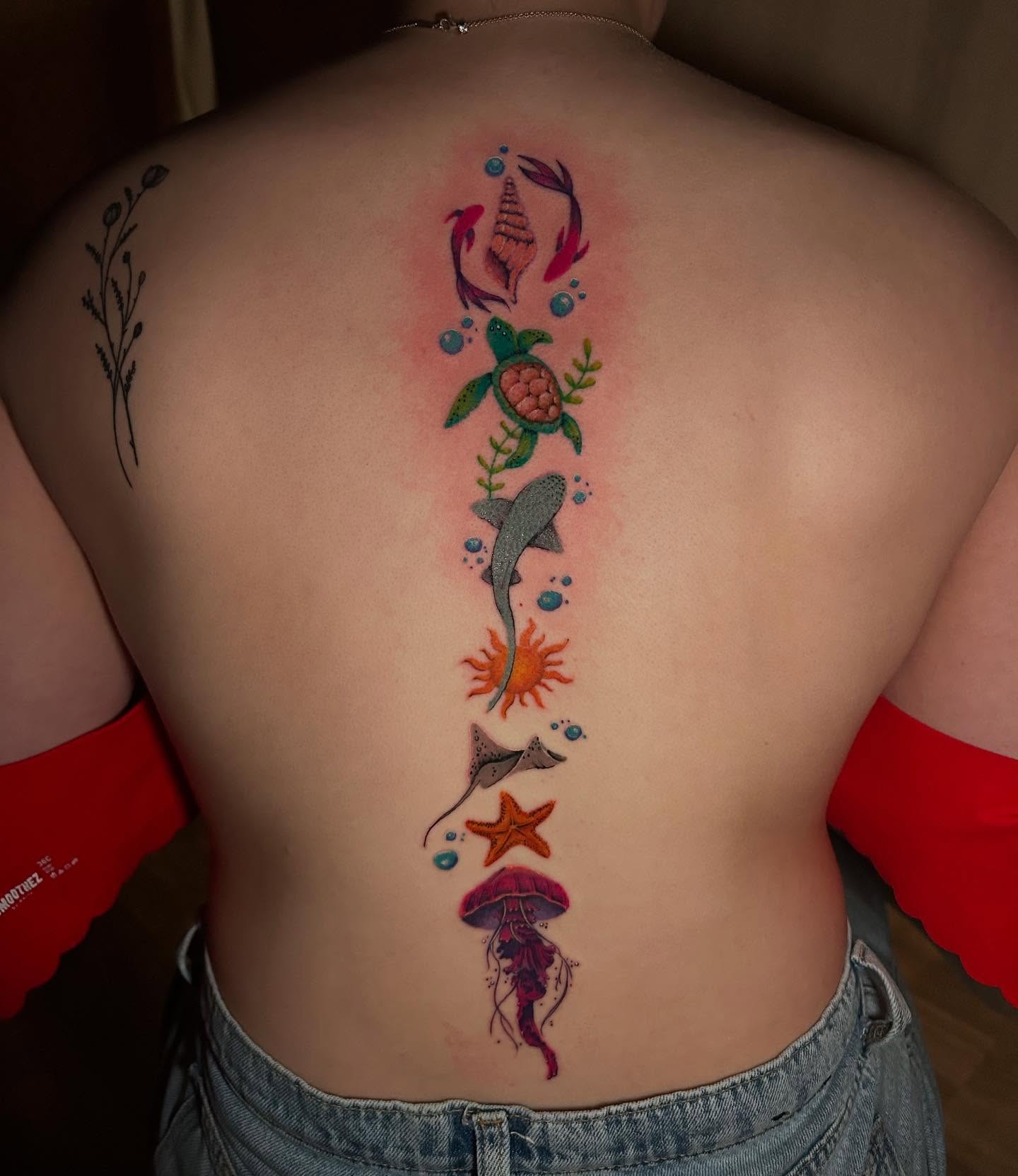 Vibrant Ocean Life Spine Tattoo Tattoo Design