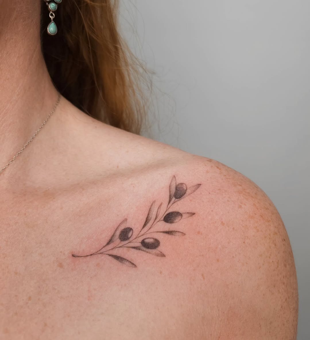 Delicate olive branch tattoo on shoulder area Tattoo Design