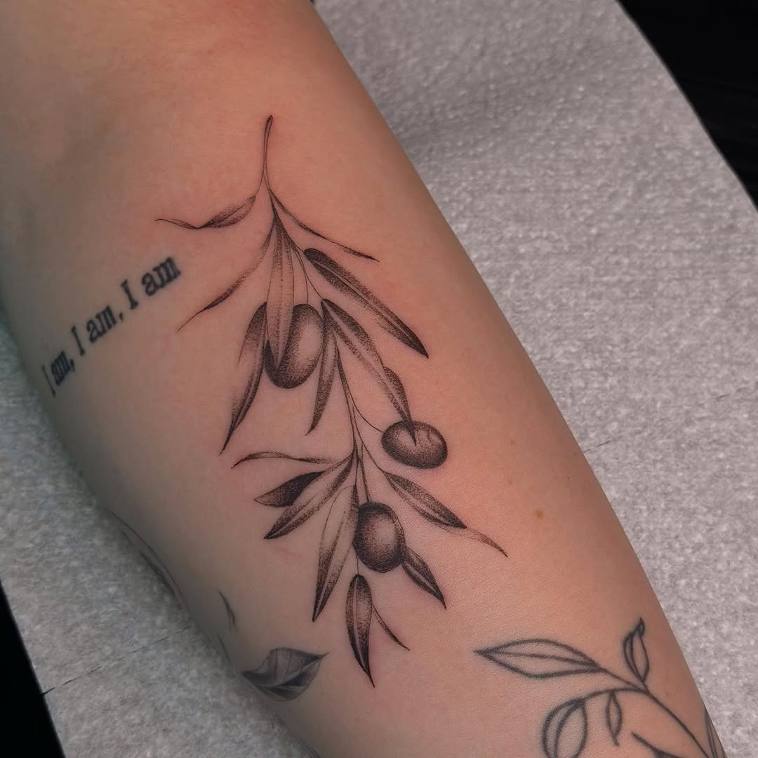Graceful olive branch tattoo on forearm art Tattoo Design