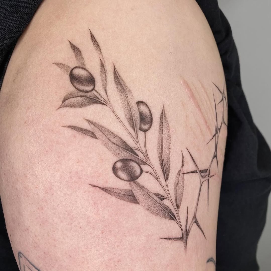 Intricate olive branch tattoo design on arm Tattoo Design