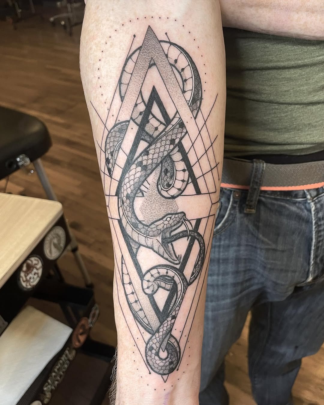 Intricate geometric ouroboros tattoo design Tattoo Design