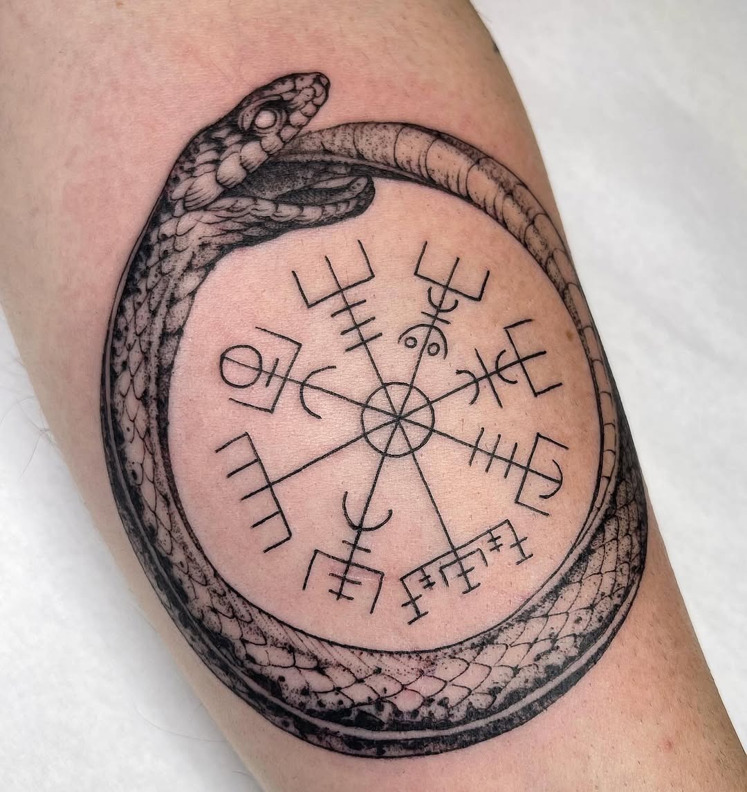 Intricate ouroboros tattoo with symbolic elements Tattoo Design