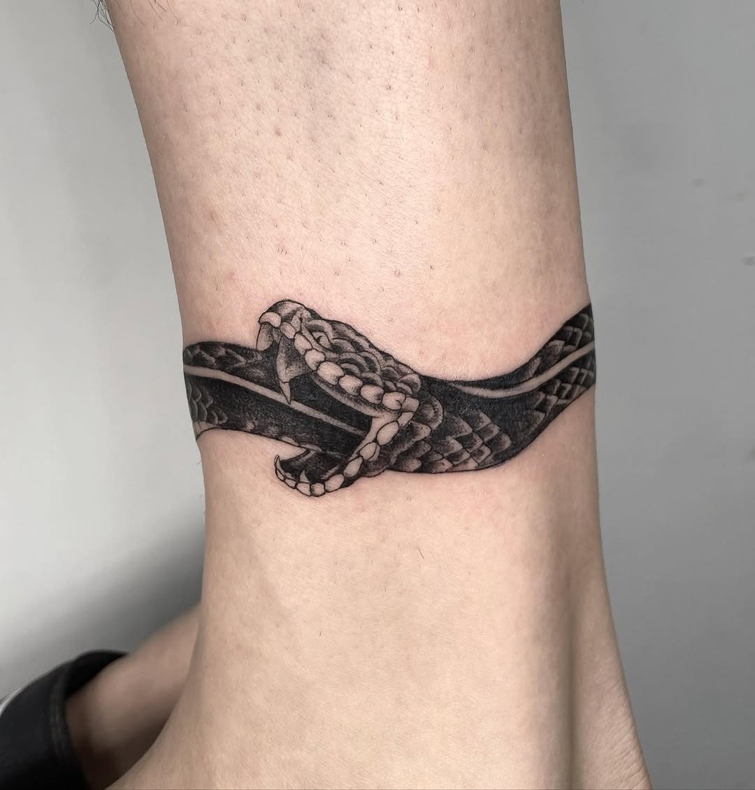 Intricate Snake Ouroboros Tattoo on Ankle Tattoo Design
