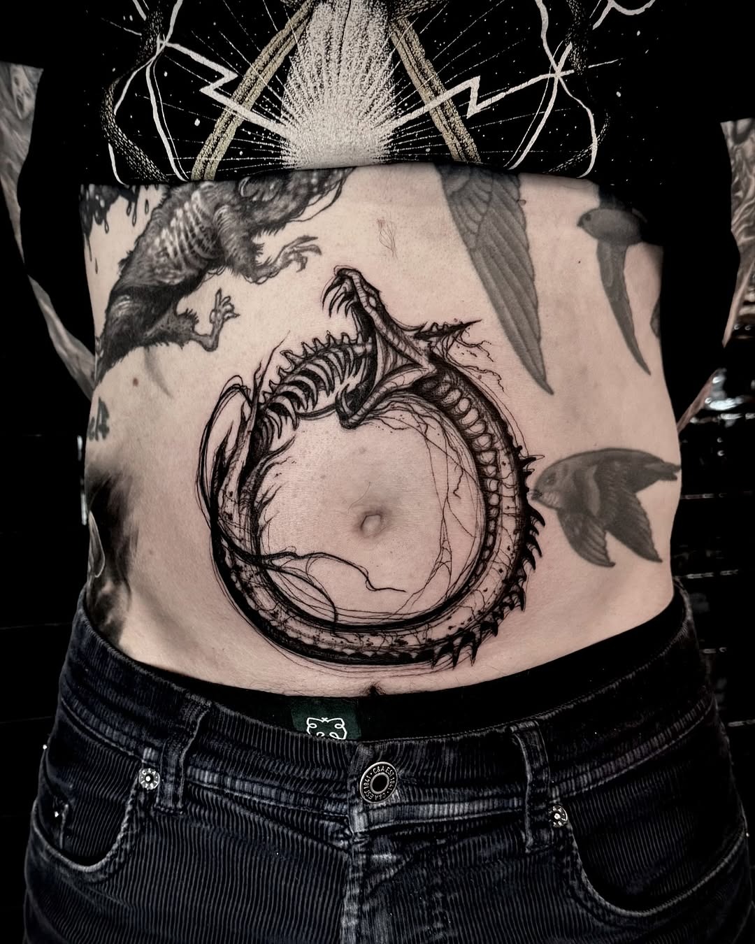 Stunning ouroboros tattoo on belly Tattoo Design