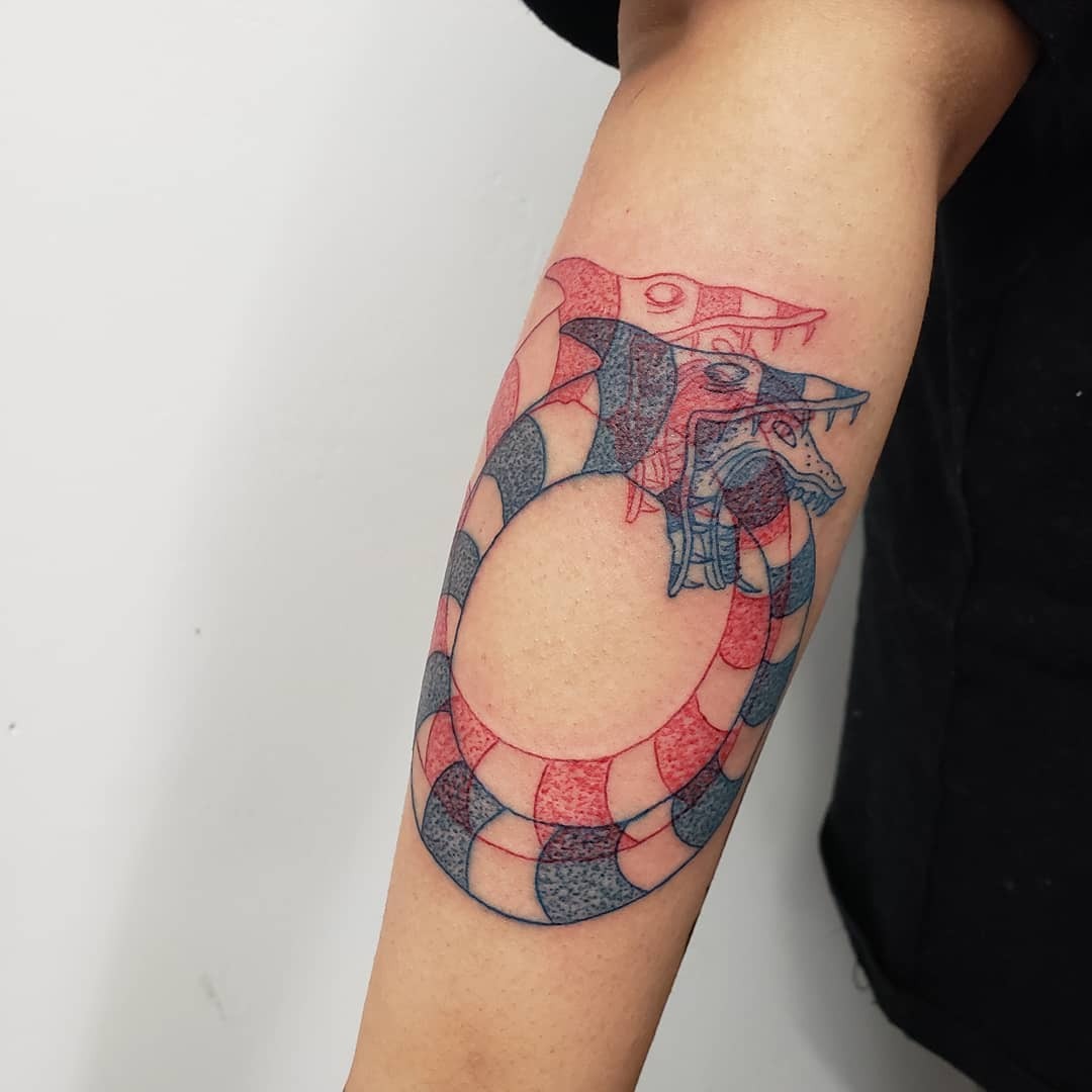 Stylish and intricate ouroboros tattoo design Tattoo Design