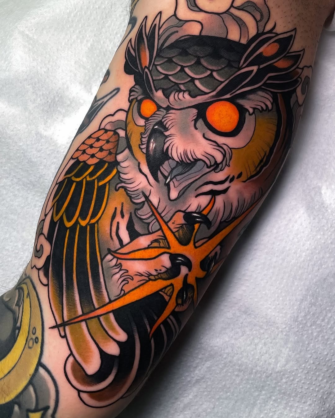 Artistic owl tattoo with vibrant colors Tattoo Design