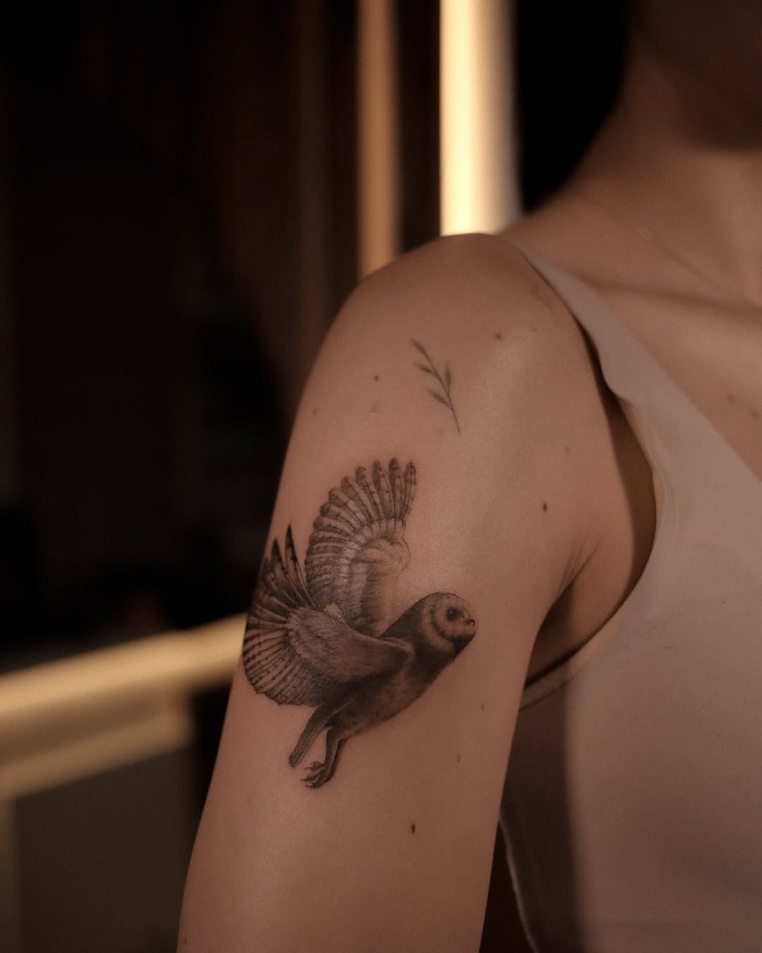 Elegant flying owl tattoo on the arm Tattoo Design