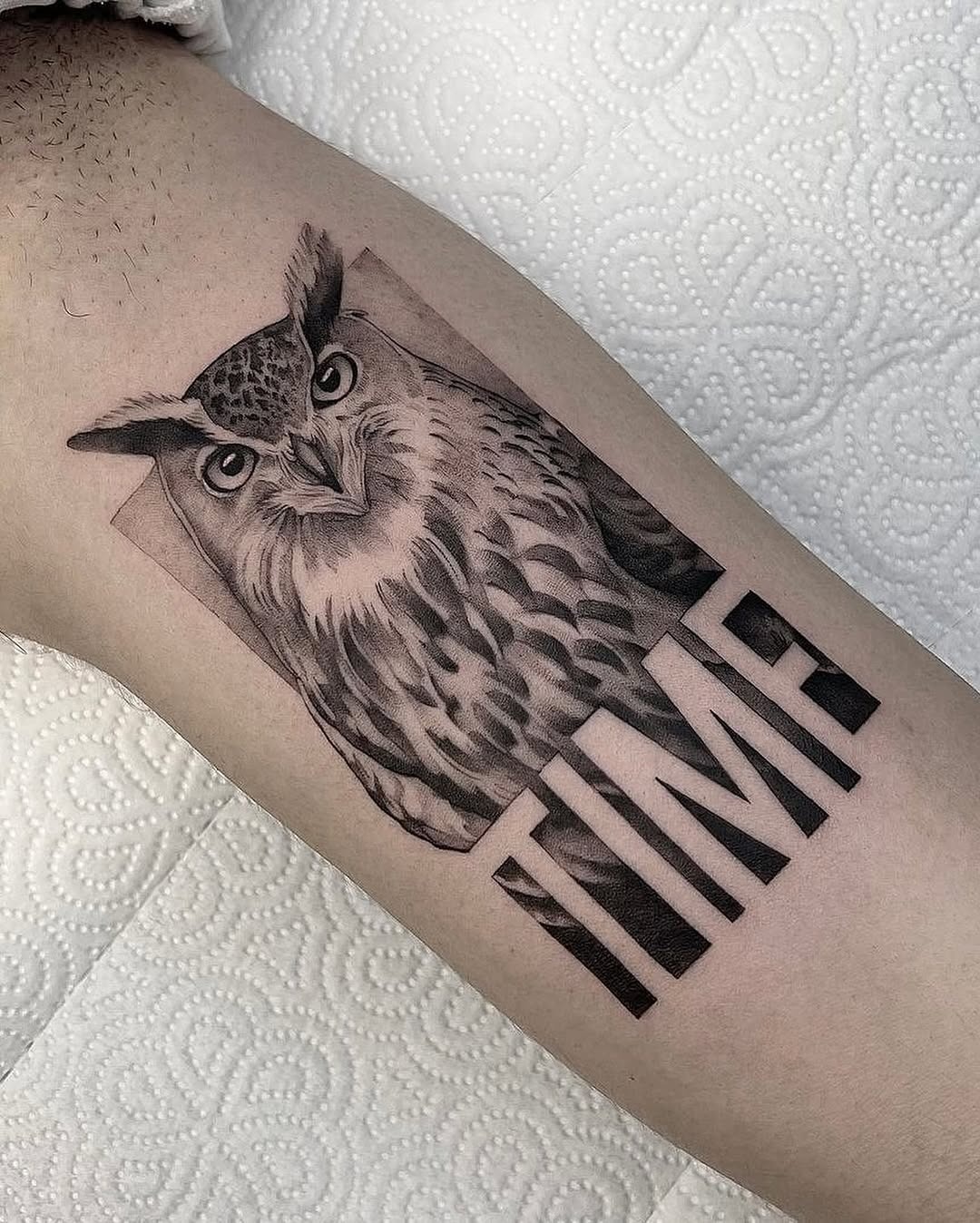 Intricate owl tattoo with a bold message Tattoo Design