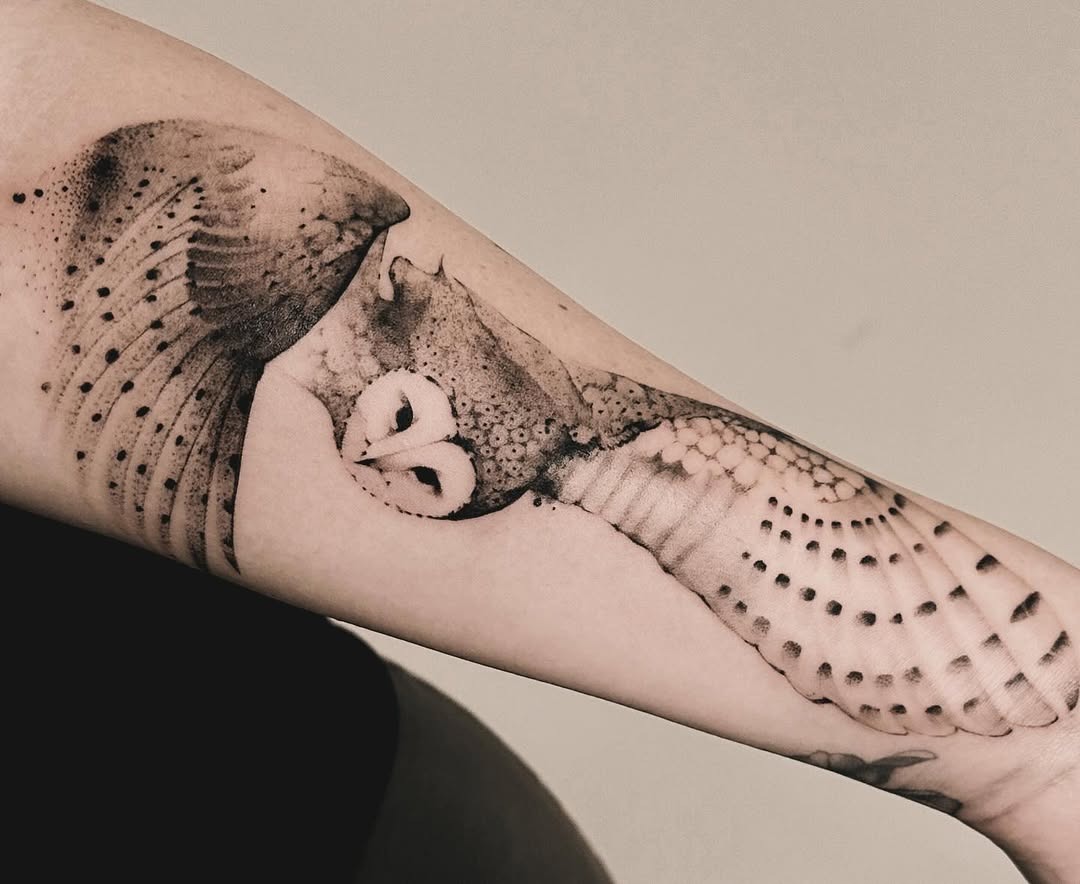 Intricate owl tattoo with detailed feather patterns Tattoo Design