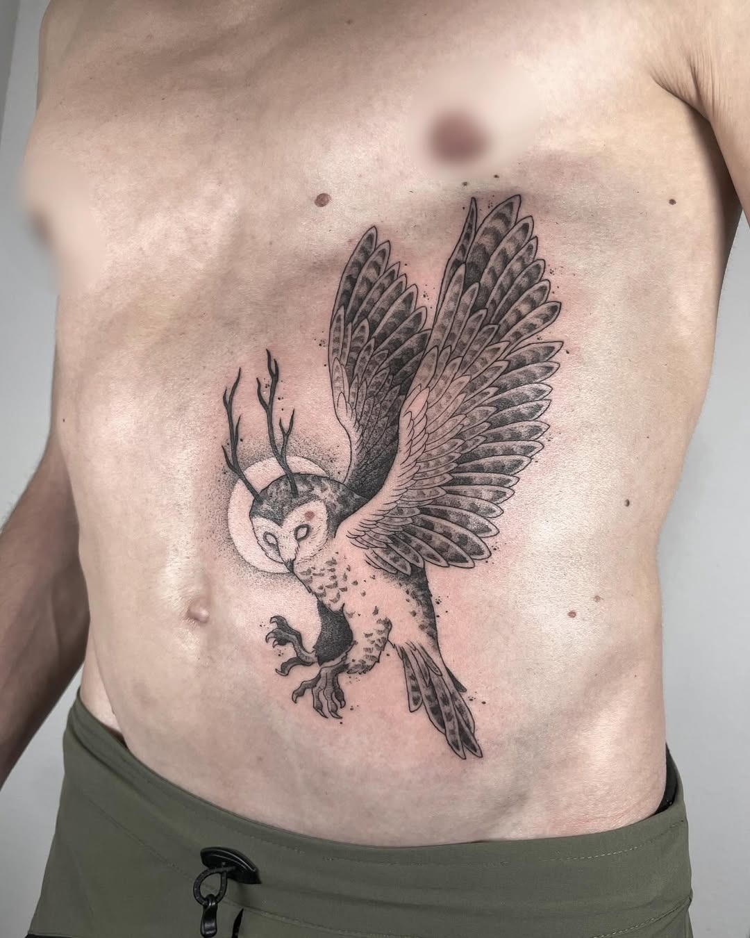 Majestic owl tattoo with striking wing design Tattoo Design