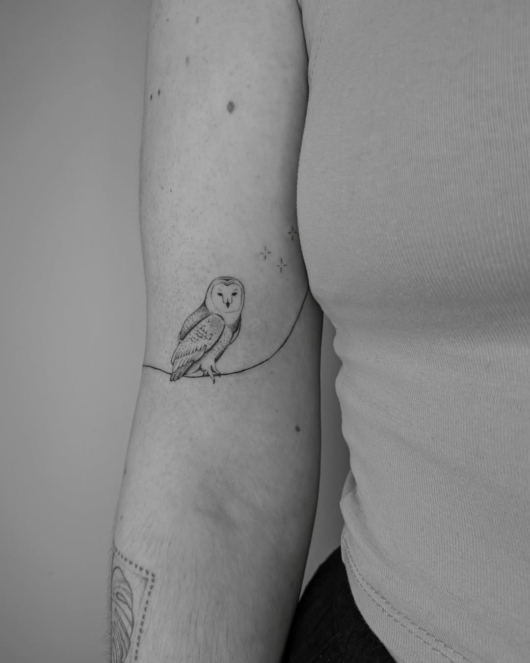 Minimalist Owl Tattoo on Arm Tattoo Design