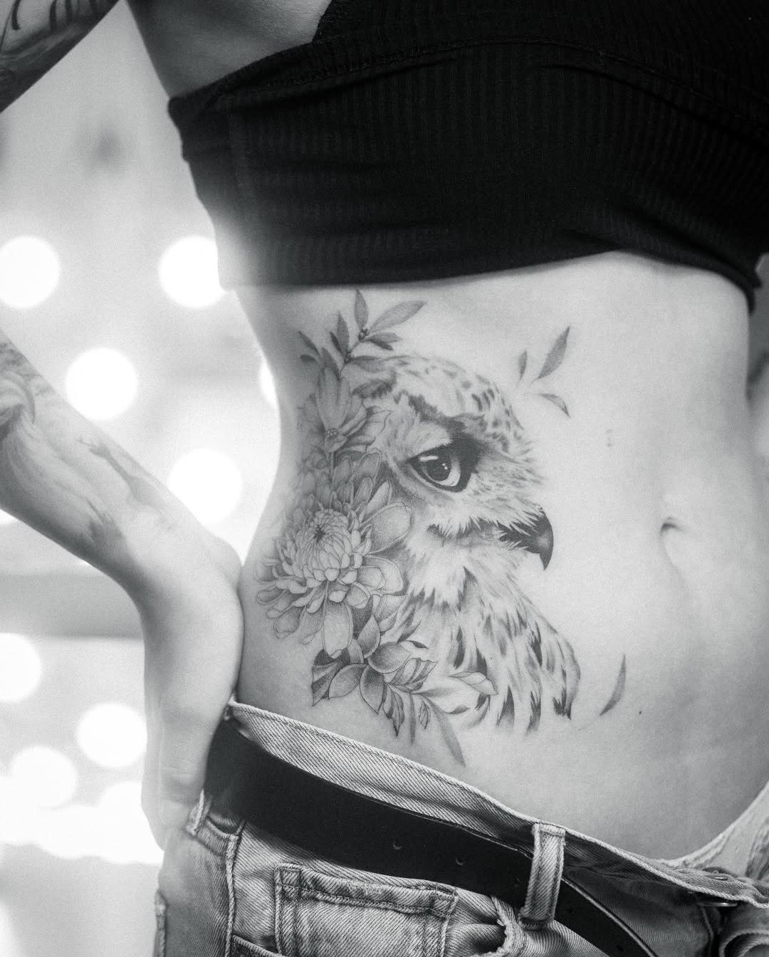 Stunning owl tattoo with floral elements Tattoo Design