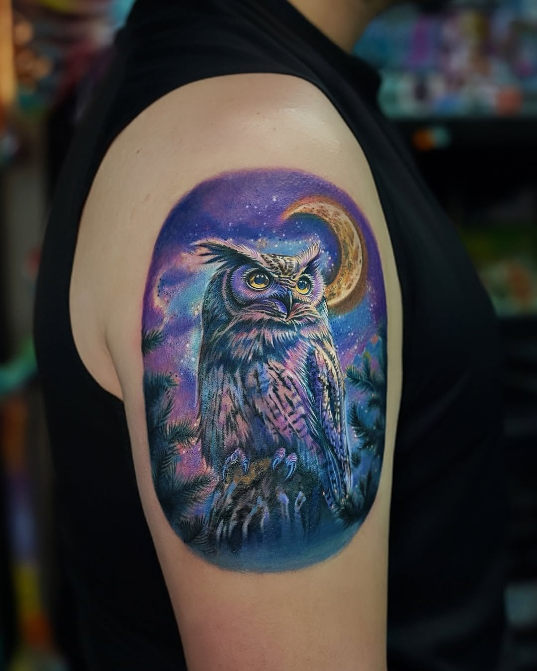 Vibrant owl tattoo against a cosmic backdrop Tattoo Design