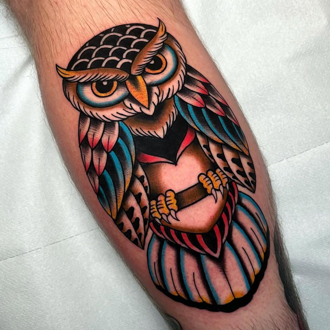 Vibrantly colored owl tattoo with unique design Tattoo Design