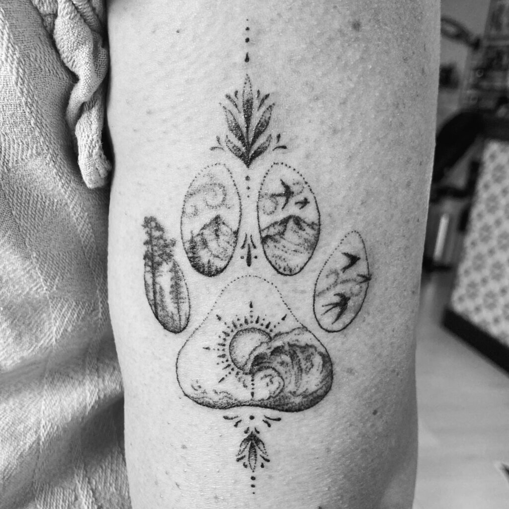 Nature-Themed Paw Print Tattoo Tattoo Design