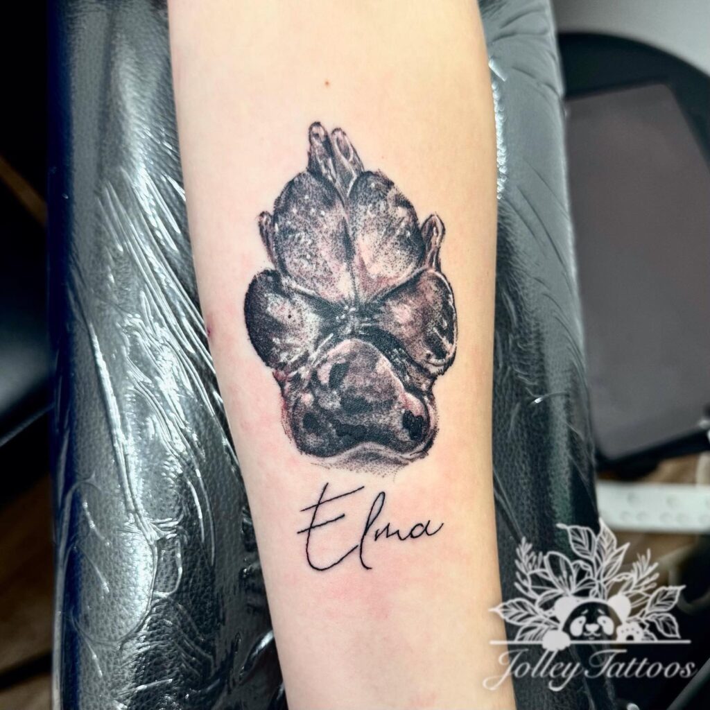 Realistic Paw Print Tattoo with Name Tattoo Design