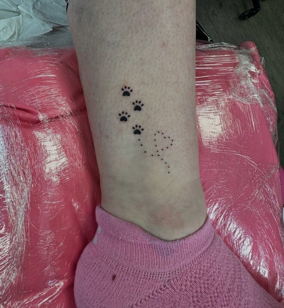 Tiny Paw Prints with Dotted Heart Tattoo Tattoo Design