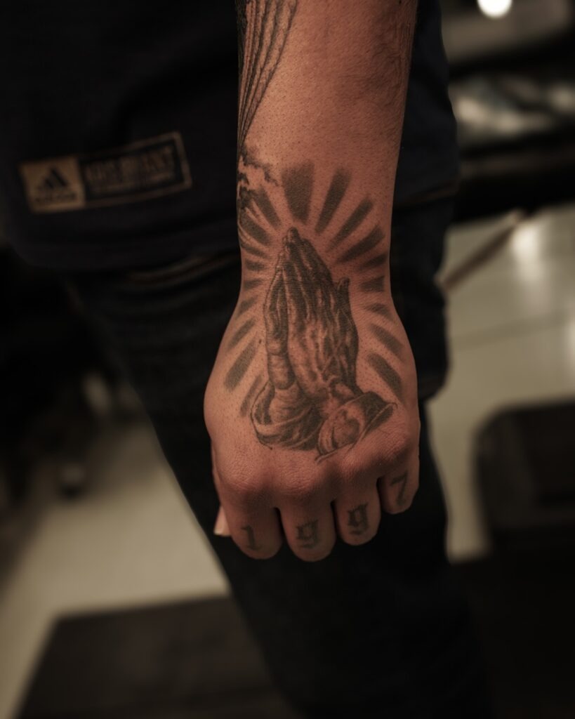 Classic Praying Hands and Rosary Tattoo on Chest Tattoo Design