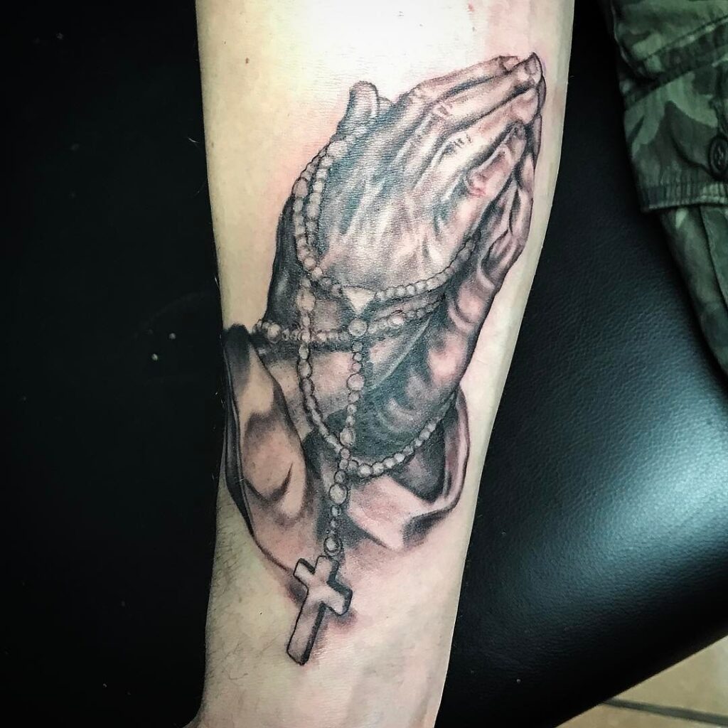 Praying Hands Hand Tattoo with Radiant Lines Tattoo Design