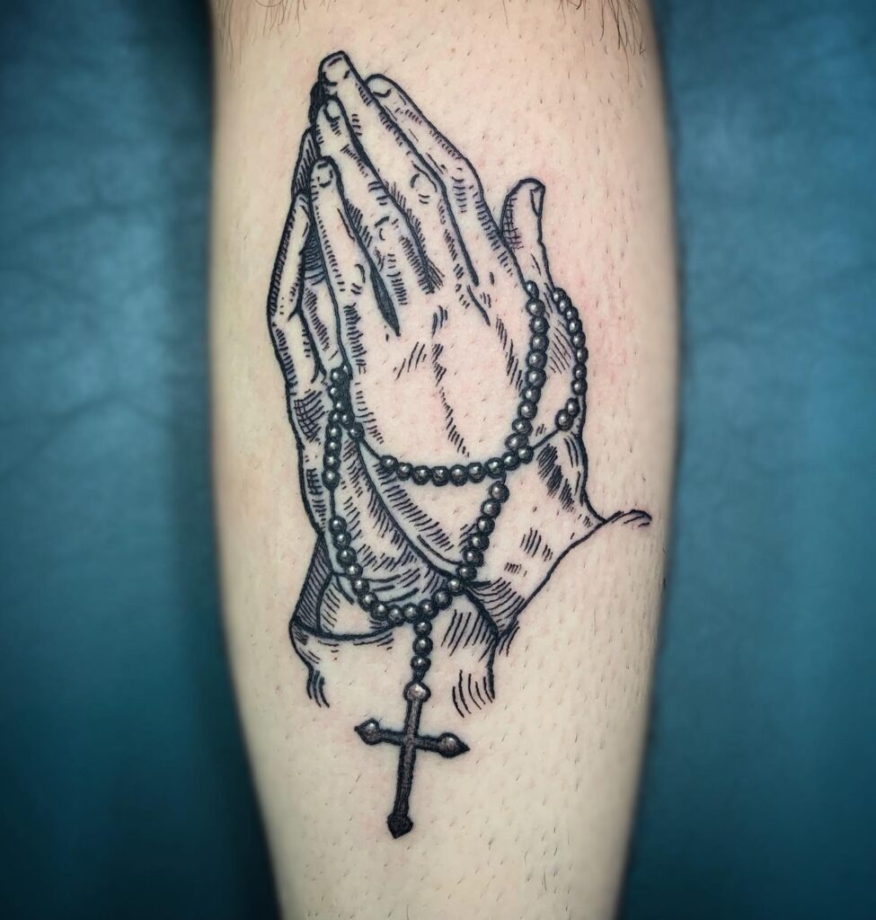 Praying Hands with Radiant Beams and Thorned Rose Tattoo Tattoo Design