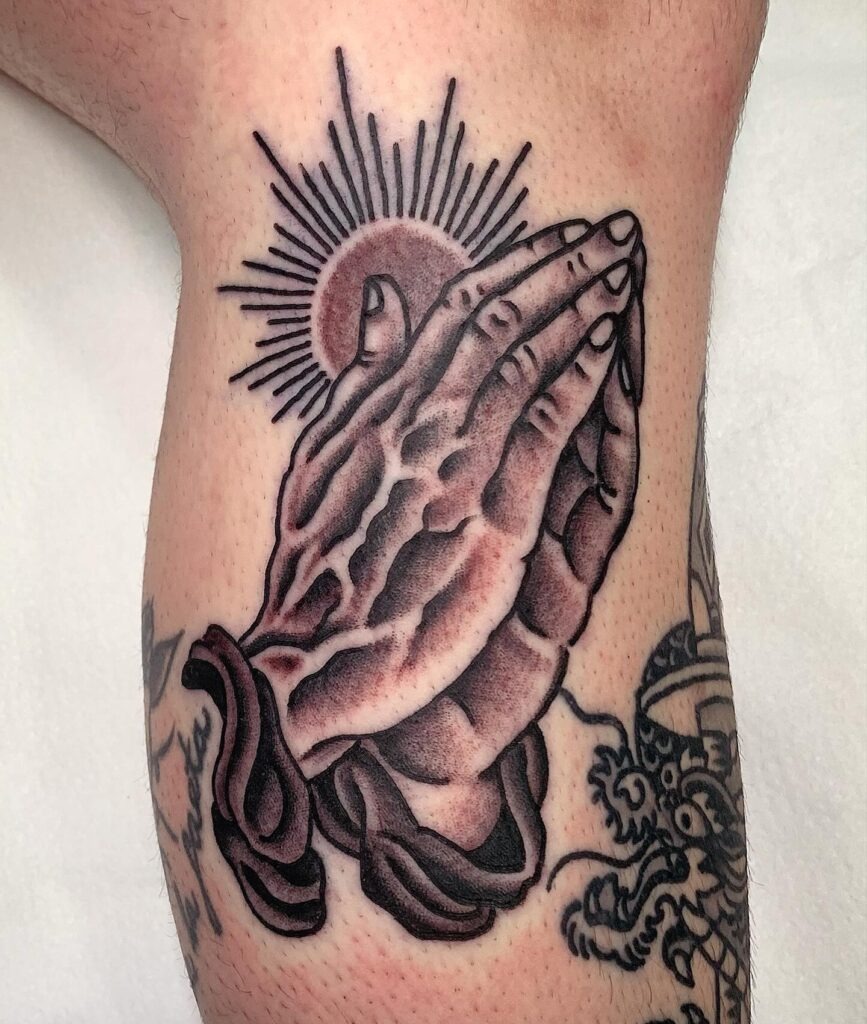 Praying Hands with Sunburst Tattoo Tattoo Design