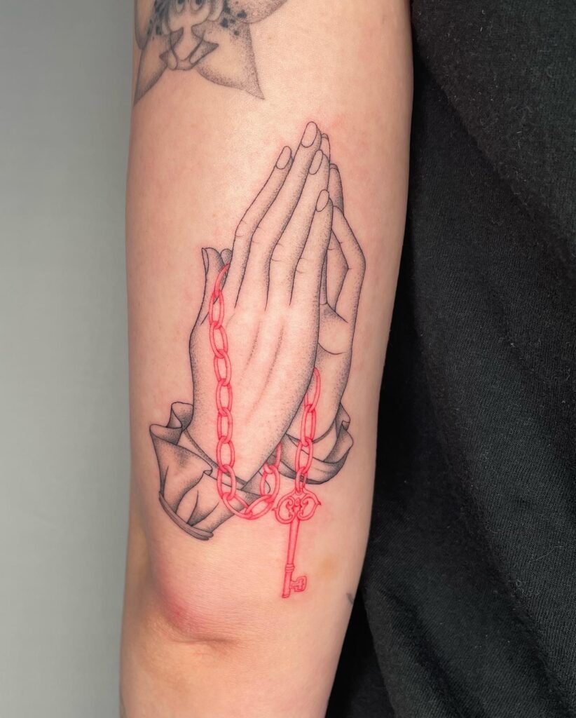 Realistic Praying Hands Tattoo on Chest Tattoo Design
