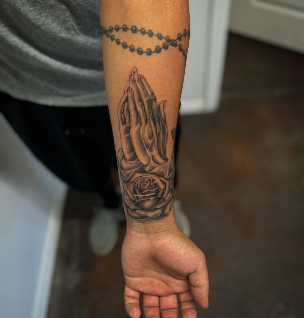 Traditional Praying Hands Tattoo with Flames Tattoo Design