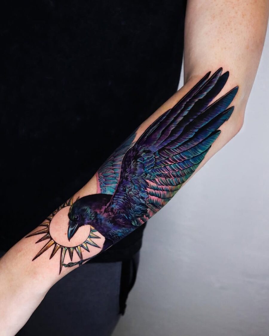 Colorful Raven Tattoo with Radiant Sun Design Tattoo Design