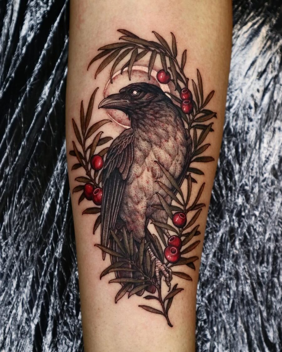Elegant raven tattoo adorned with berries Tattoo Design