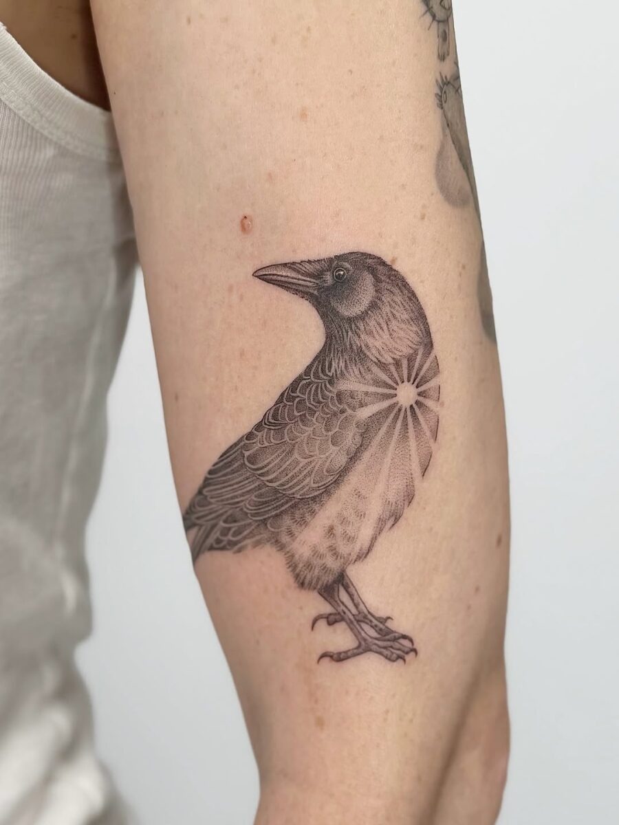 Intricate raven tattoo on forearm Tattoo Design