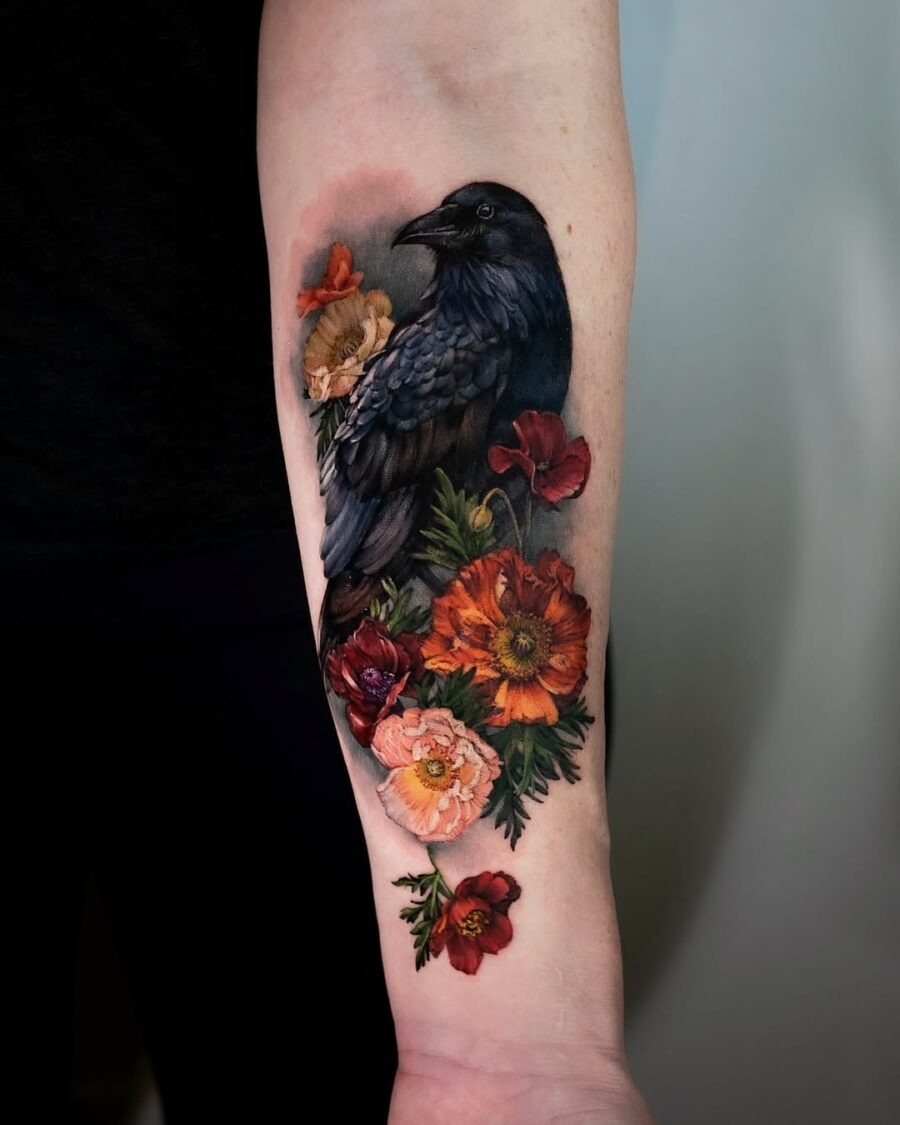 Intricate Raven Tattoo Surrounded by Colorful Blooms Tattoo Design