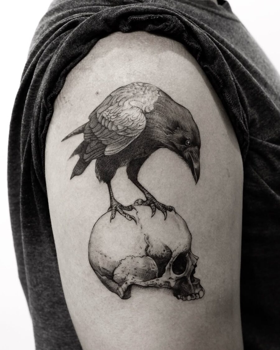 Striking Raven Tattoo on Skull Design Tattoo Design