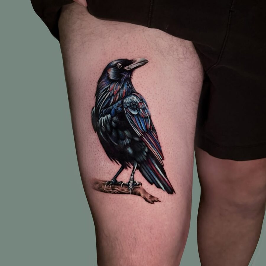 Stunning raven tattoo on thigh showcases beauty Tattoo Design