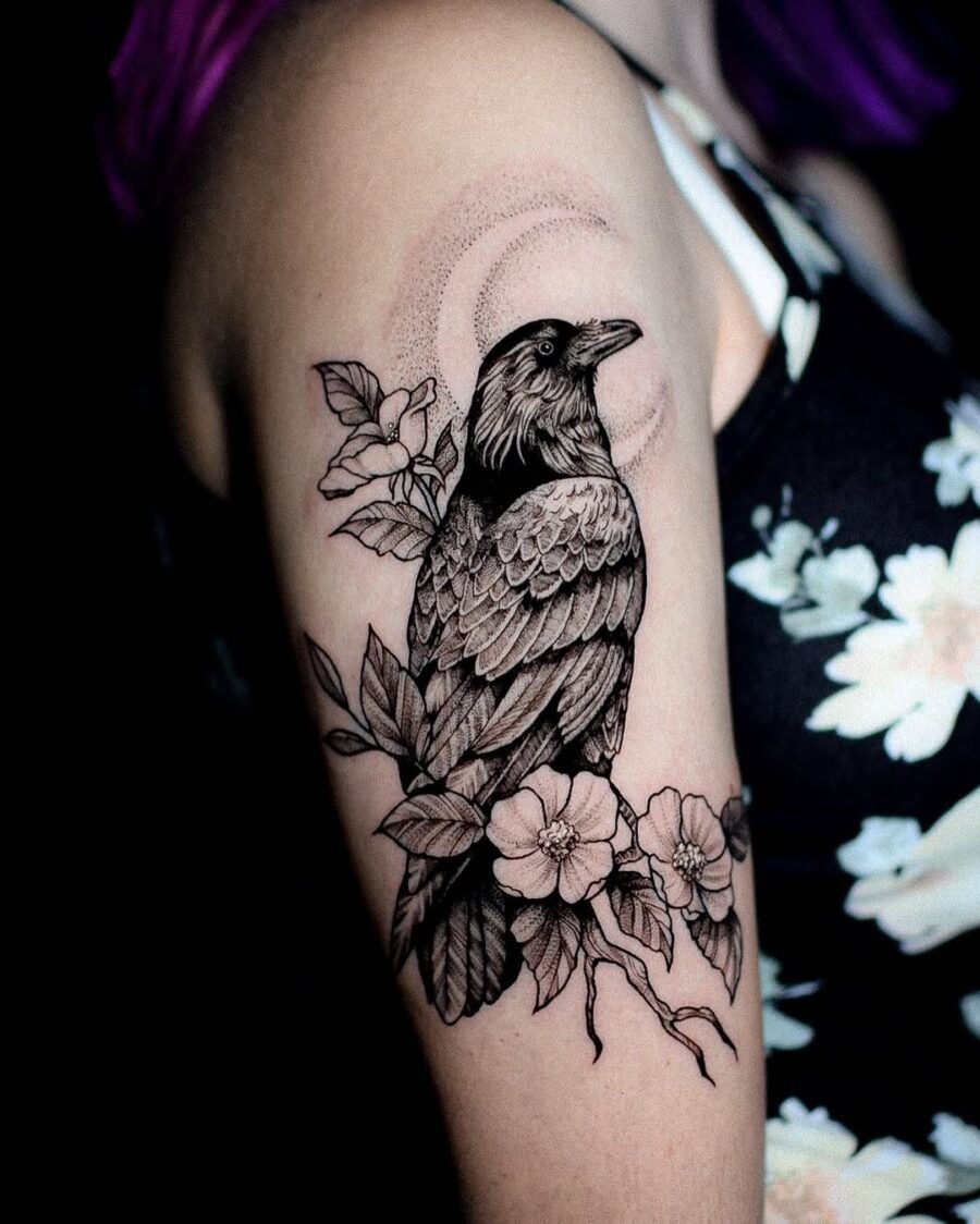 Stunning Raven Tattoo with Floral Elements Tattoo Design